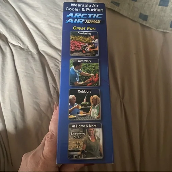 Arctic Air Freedom, a wearable personal air cooler and purifier. 
NEW IN BOX - Picture 3 of 4
